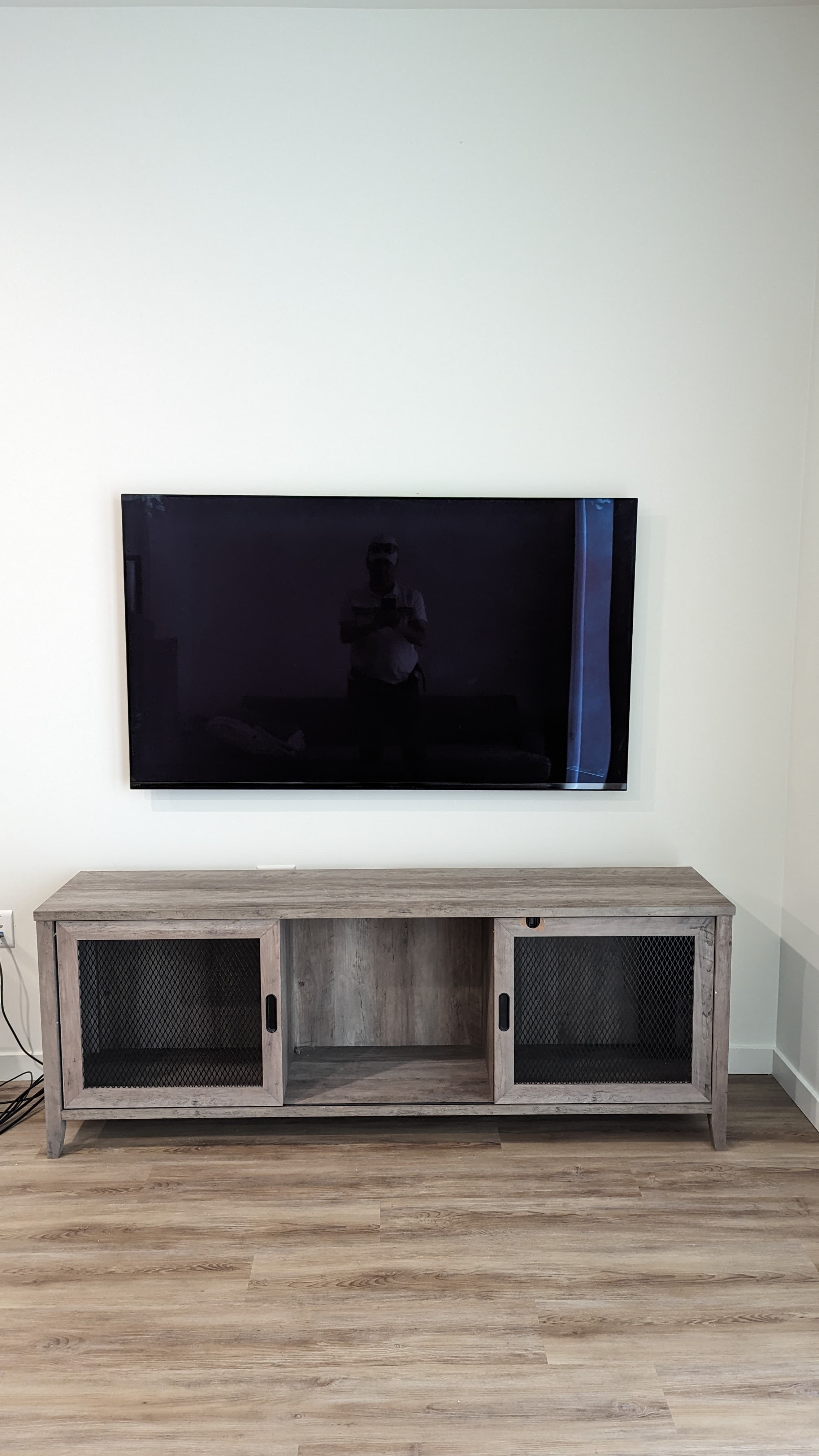 Clean TV mount above farmhouse console in Sacramento, CA