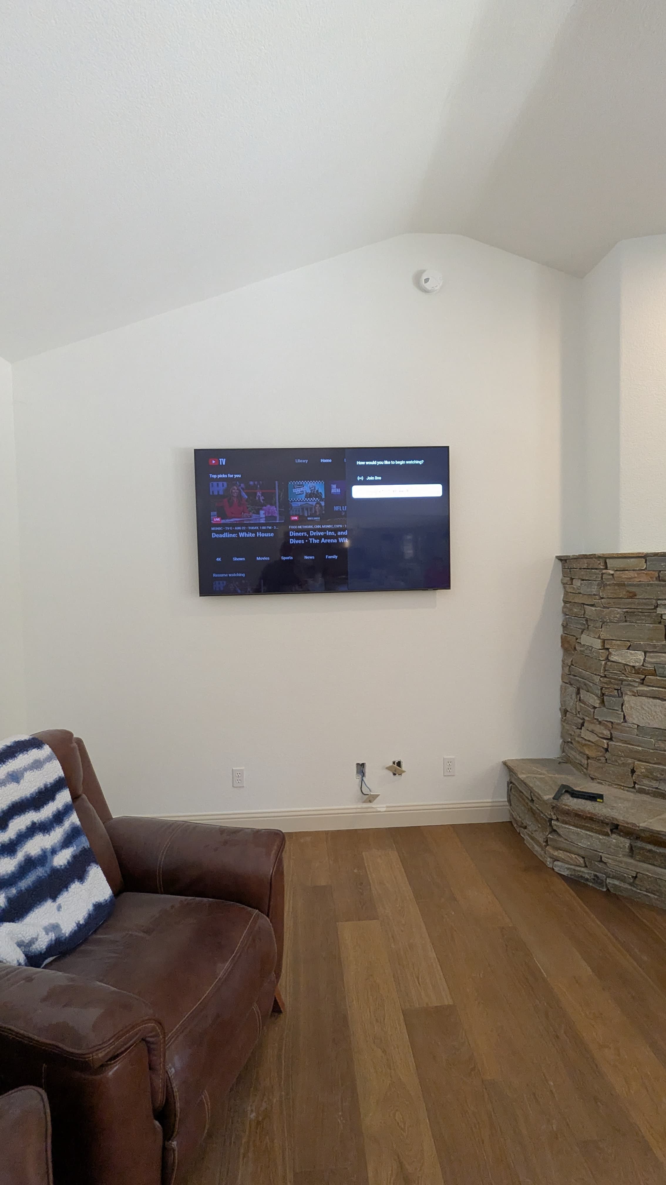 TV mounted in vaulted ceiling living room in Auburn, CA