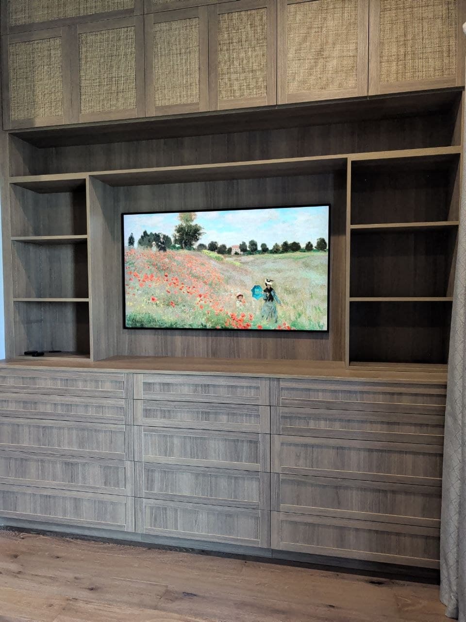 Samsung TV mounted flush in custom built-in walnut cabinet with open shelving in El Dorado Hills, CA