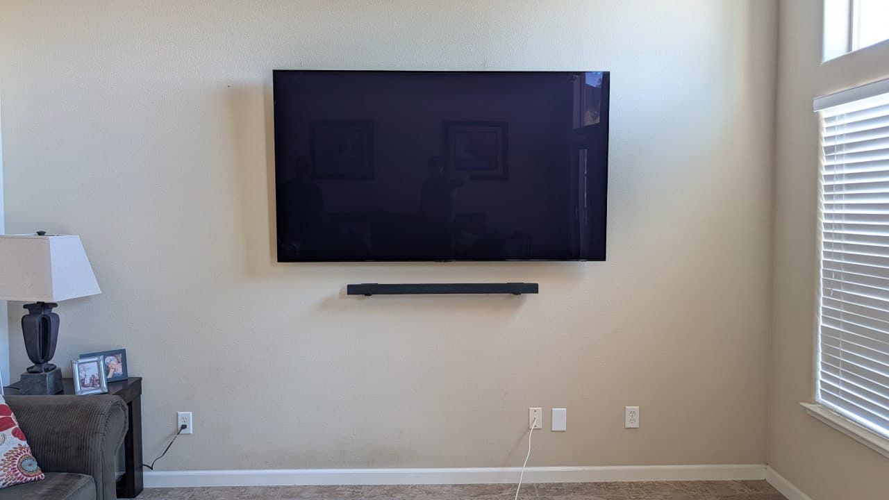 TV and 3rd-party soundbar wall mounted with wires hidden in wall in Roseville, CA