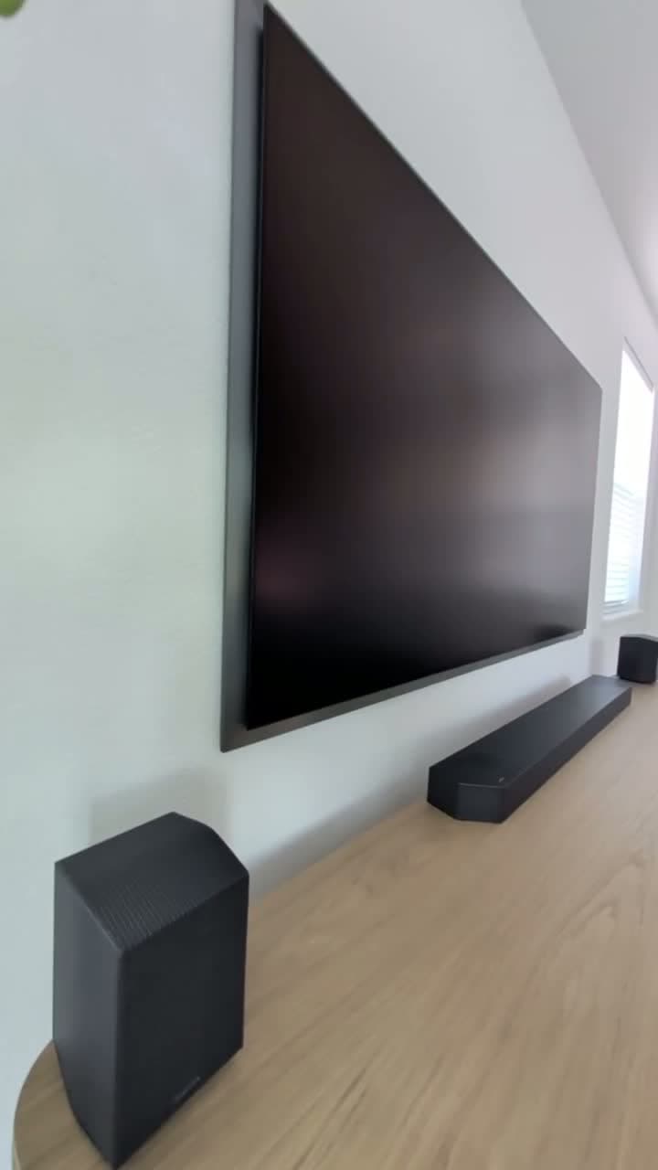 Side angle of Samsung S95F flush against wall with slim mount in Granite Bay, CA