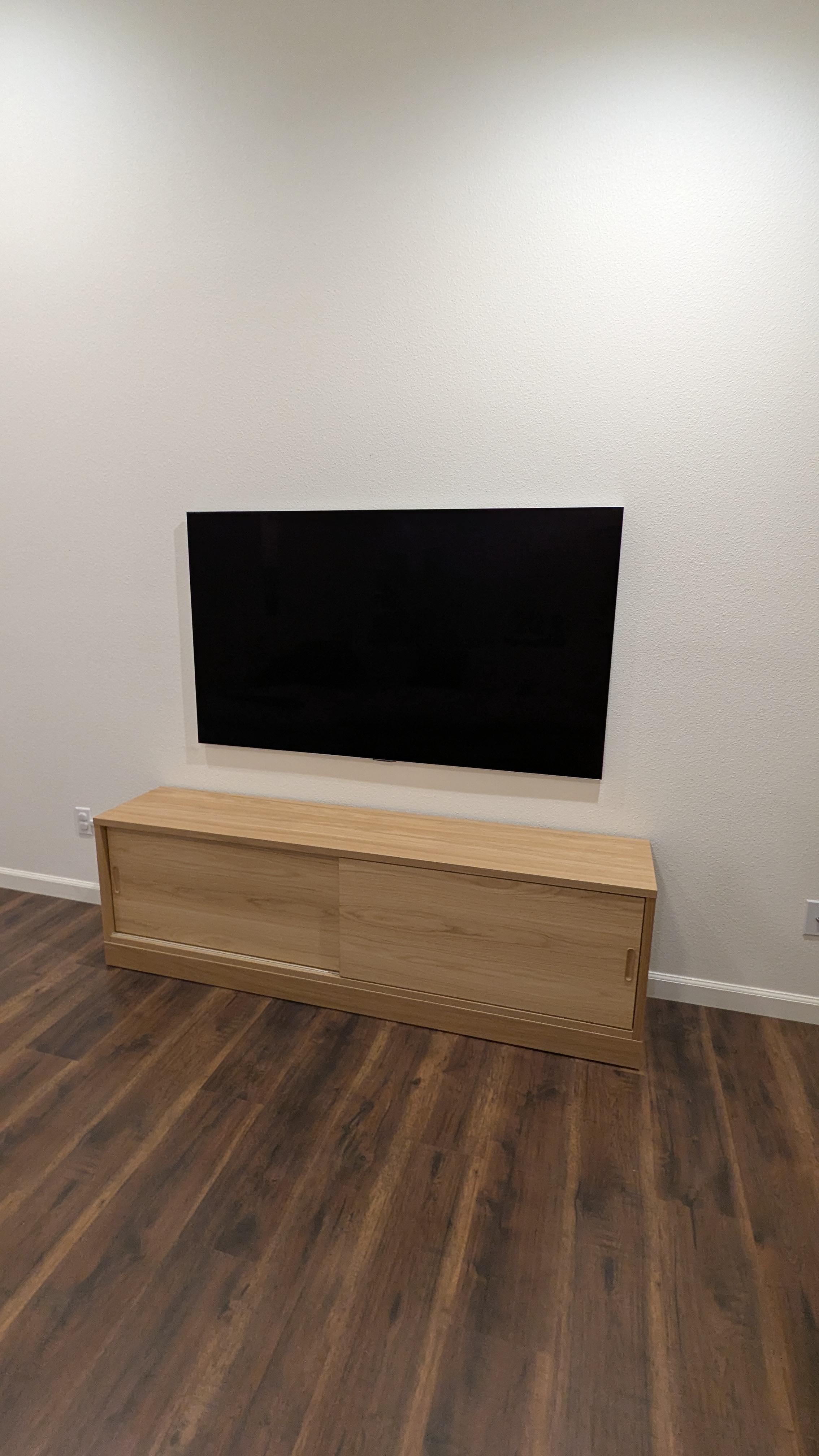 LG G5 TV above light wood floating console in Citrus Heights, CA