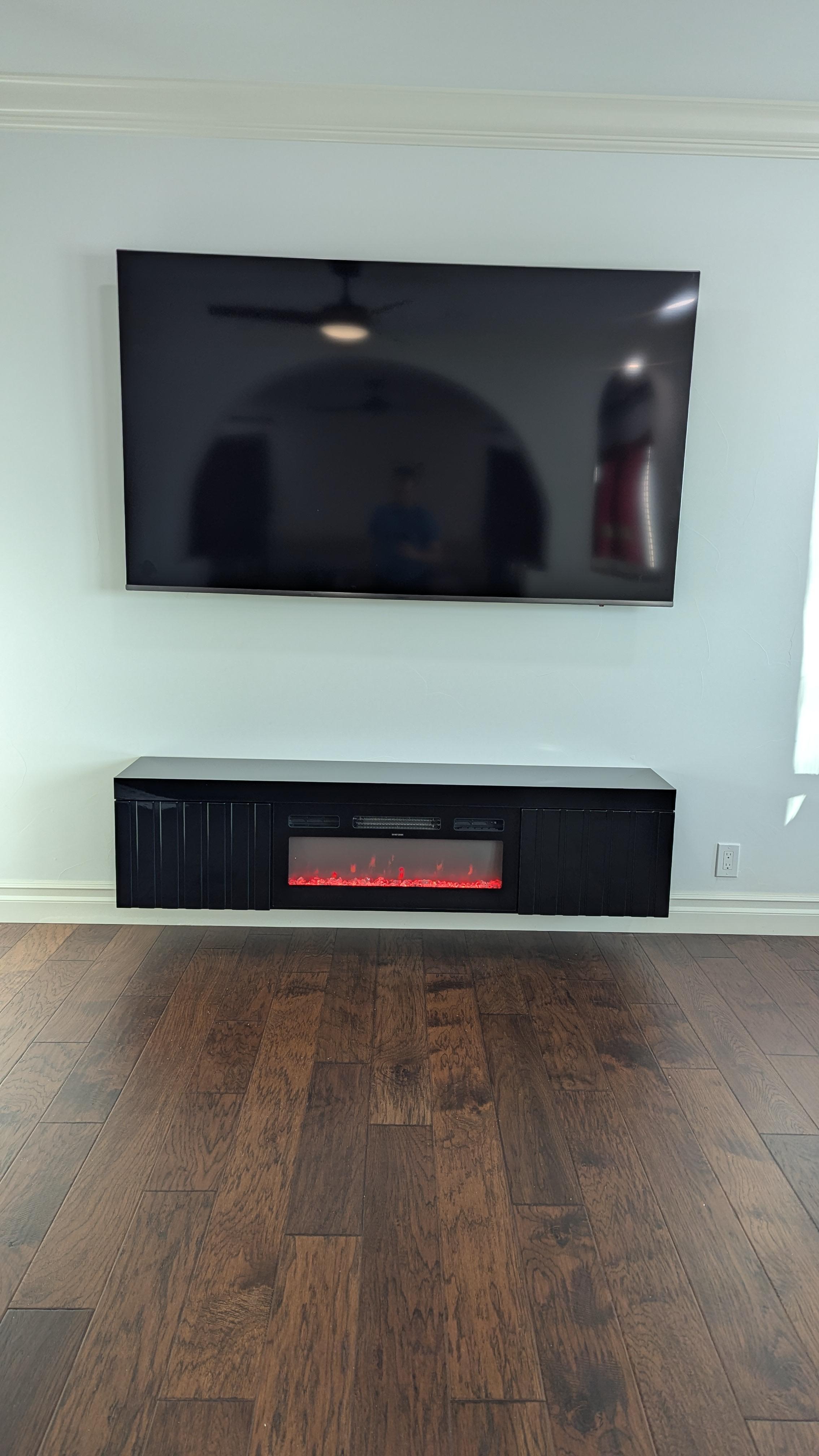 TV above floating console with electric fireplace in Rocklin, CA