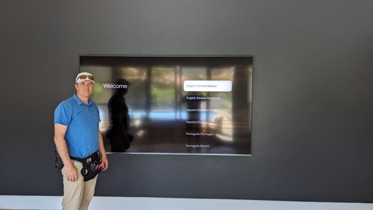 Dan with flush mounted TV on accent wall in El Dorado Hills, CA