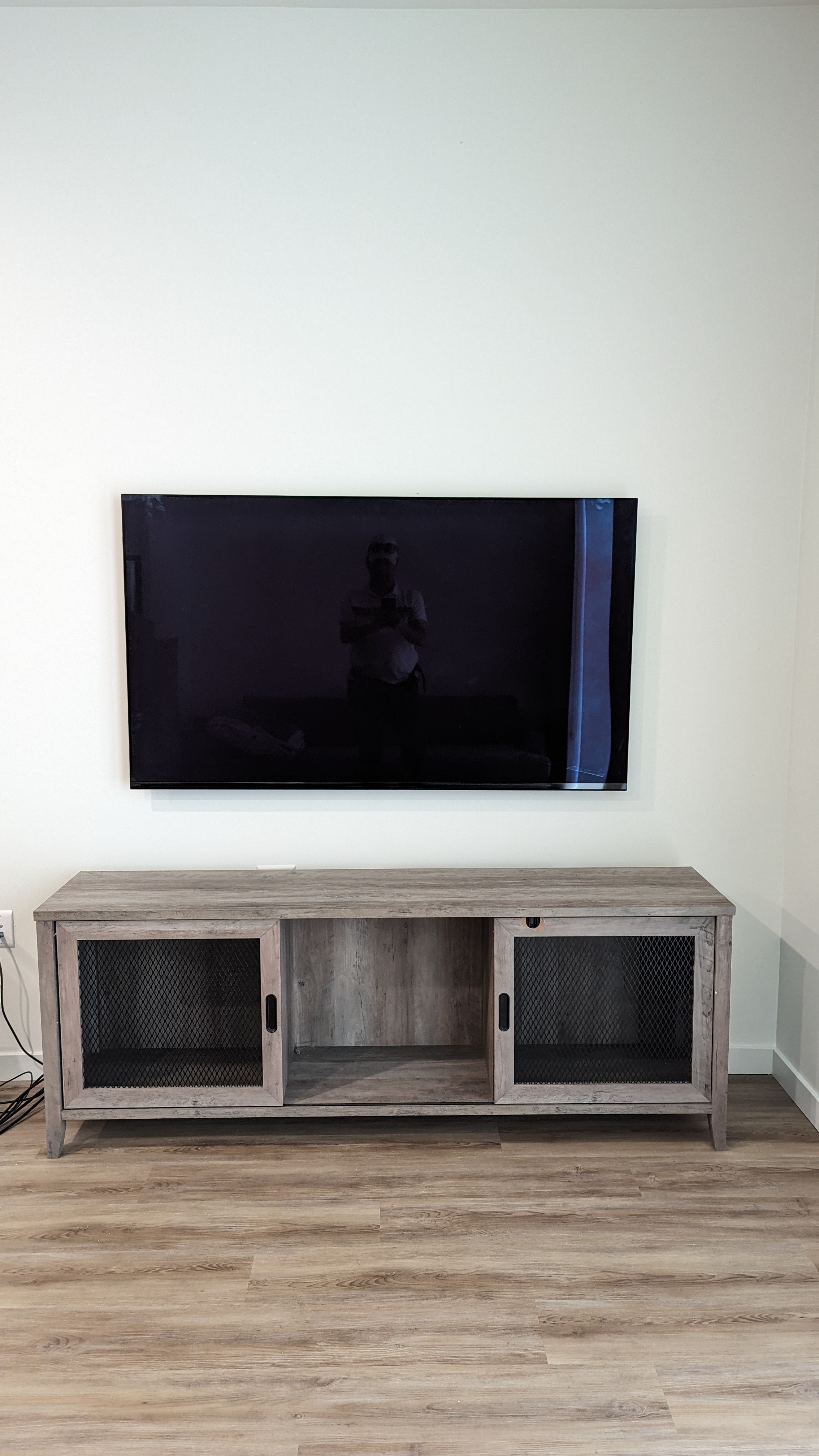 Clean TV mount above farmhouse console in Sacramento, CA