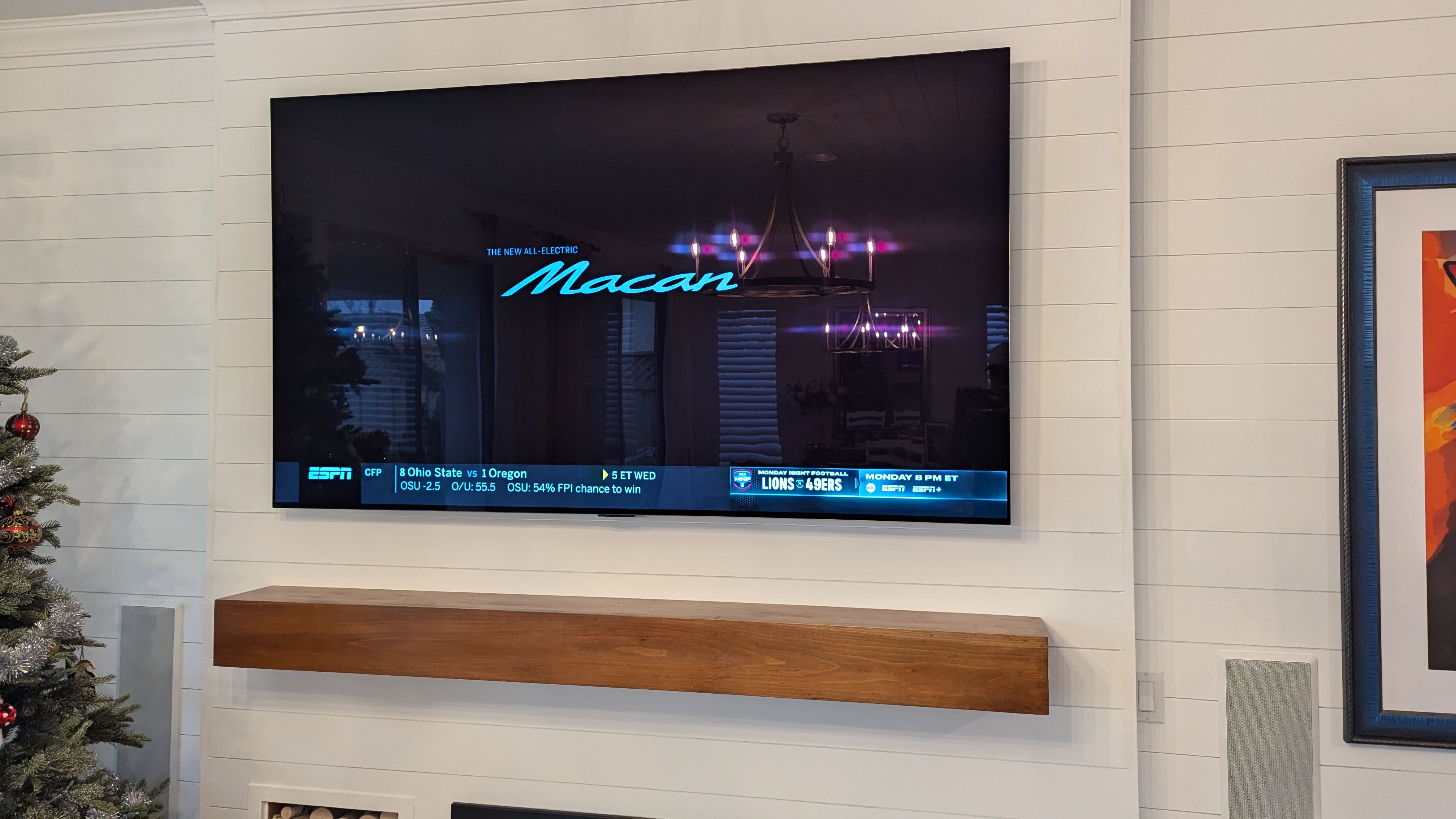 TV on shiplap wall above floating mantel and linear fireplace in Lincoln, CA
