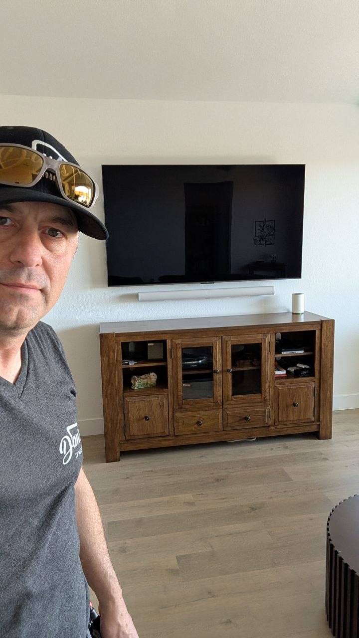 Dan with TV and floating Sonos soundbar wall-mounted below using official Sonos bracket in Rancho Cordova, CA