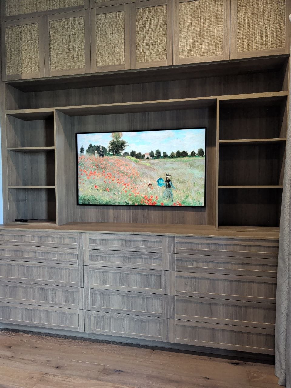 Samsung TV mounted flush in custom built-in walnut cabinet with open shelving in El Dorado Hills, CA