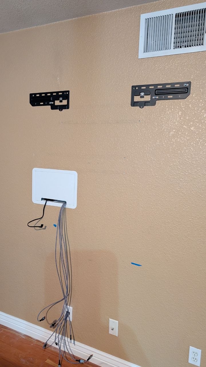 Slim TV mount brackets and Sanus in-wall cable management box on wall in Sacramento, CA